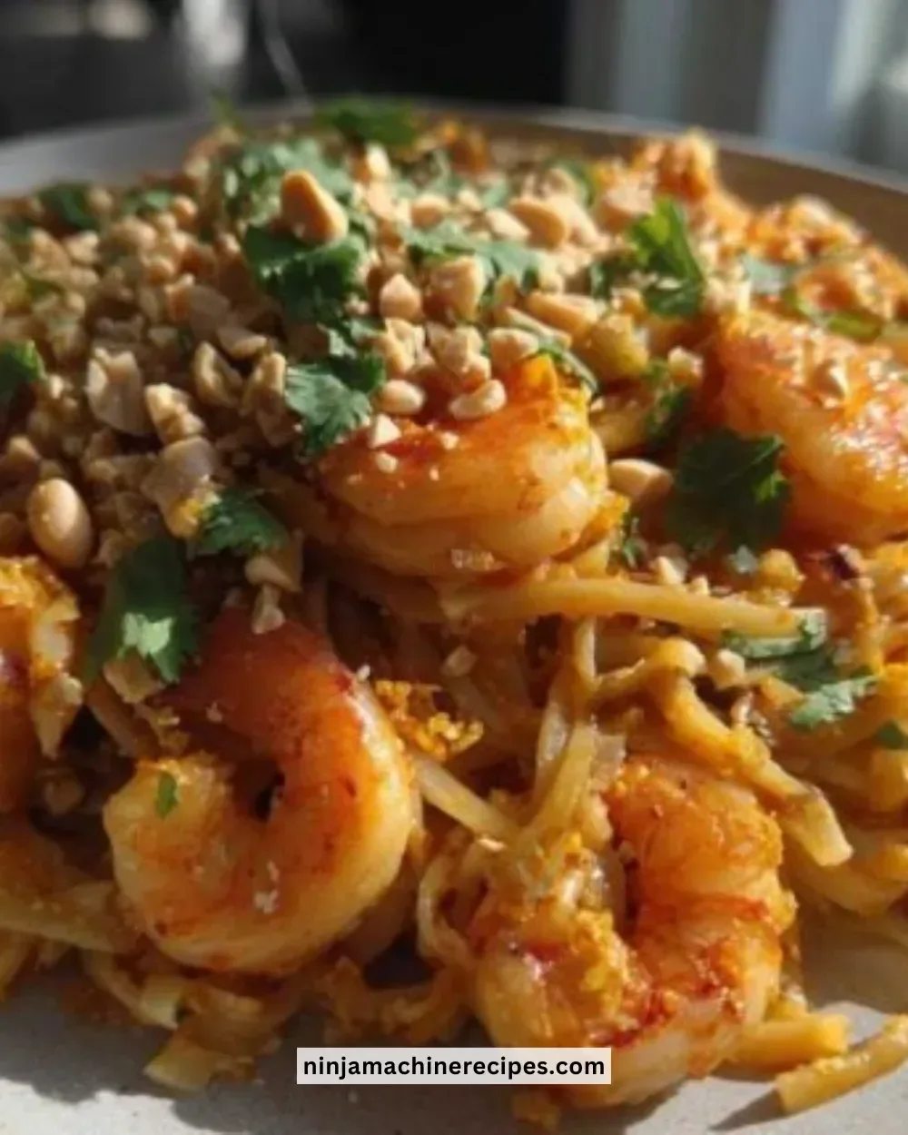 Delicious 15-Minute Pad Thai garnished with lime and peanuts