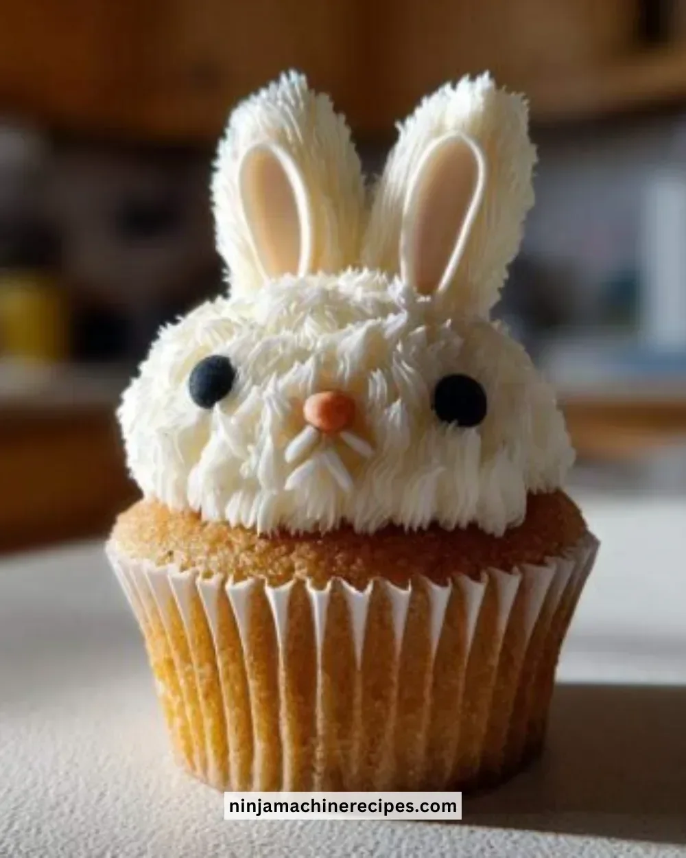 Amazing carrot cake bunny cupcakes topped with cream cheese frosting