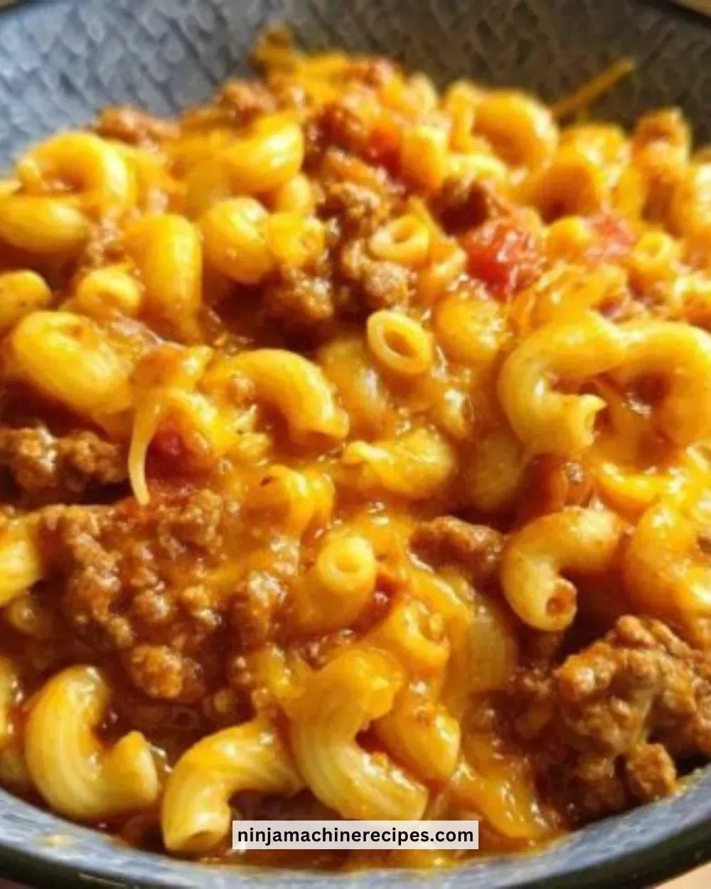 Delicious Instant Pot Chili Mac served in a bowl with toppings