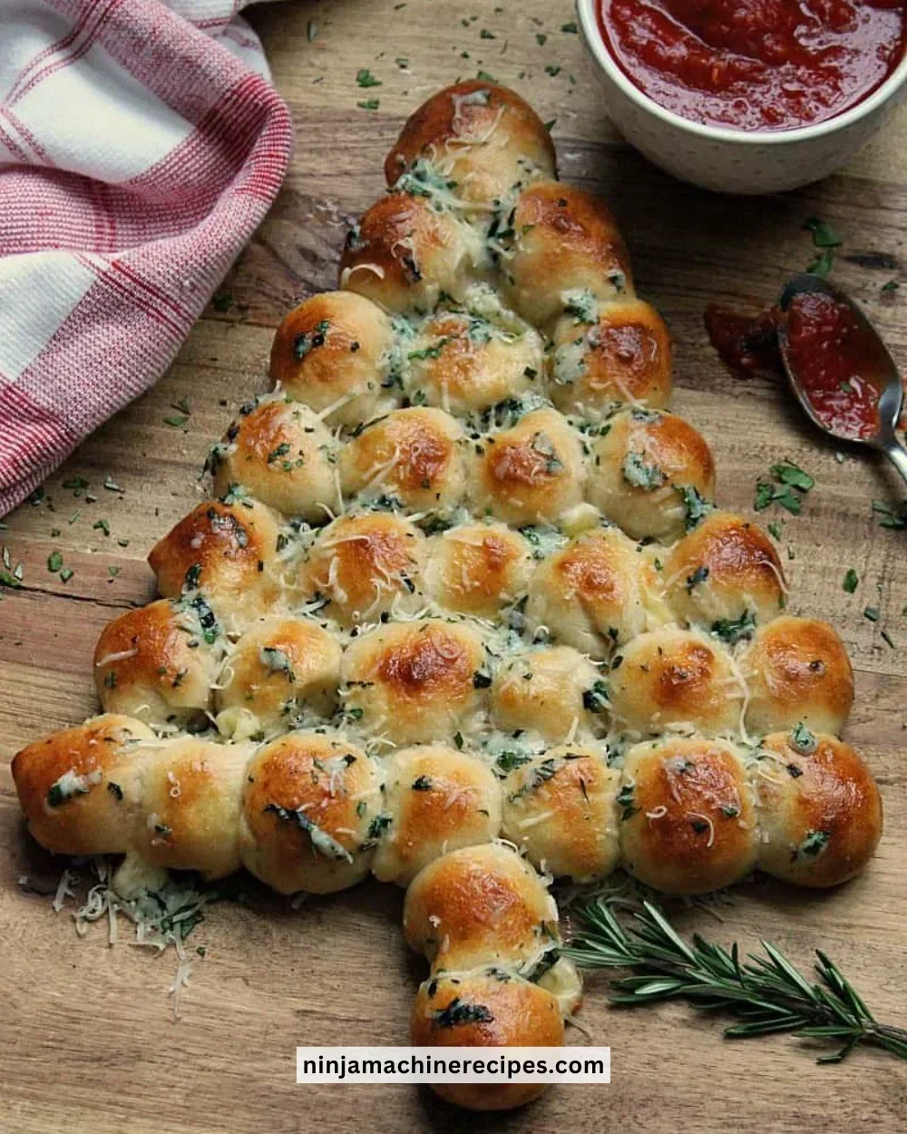 Cheesy Christmas Tree Bread shaped like a pine tree for festive gatherings