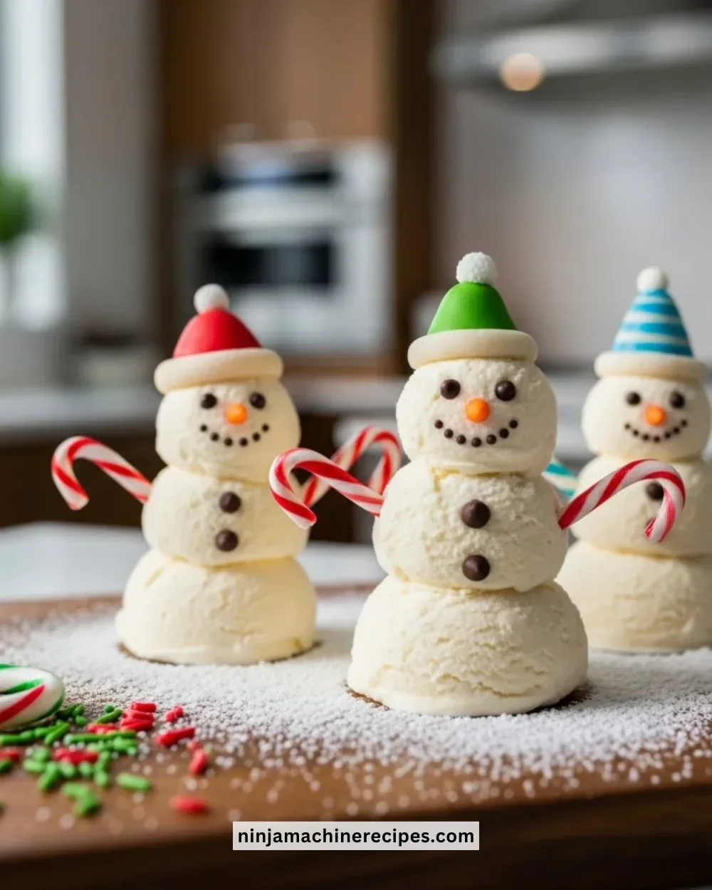 Christmas ice cream snowmen dessert on a festive table setting