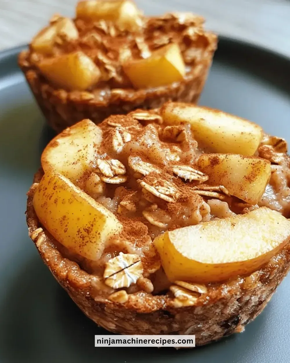 Baked apple cinnamon oatmeal cups ready to serve for a healthy breakfast