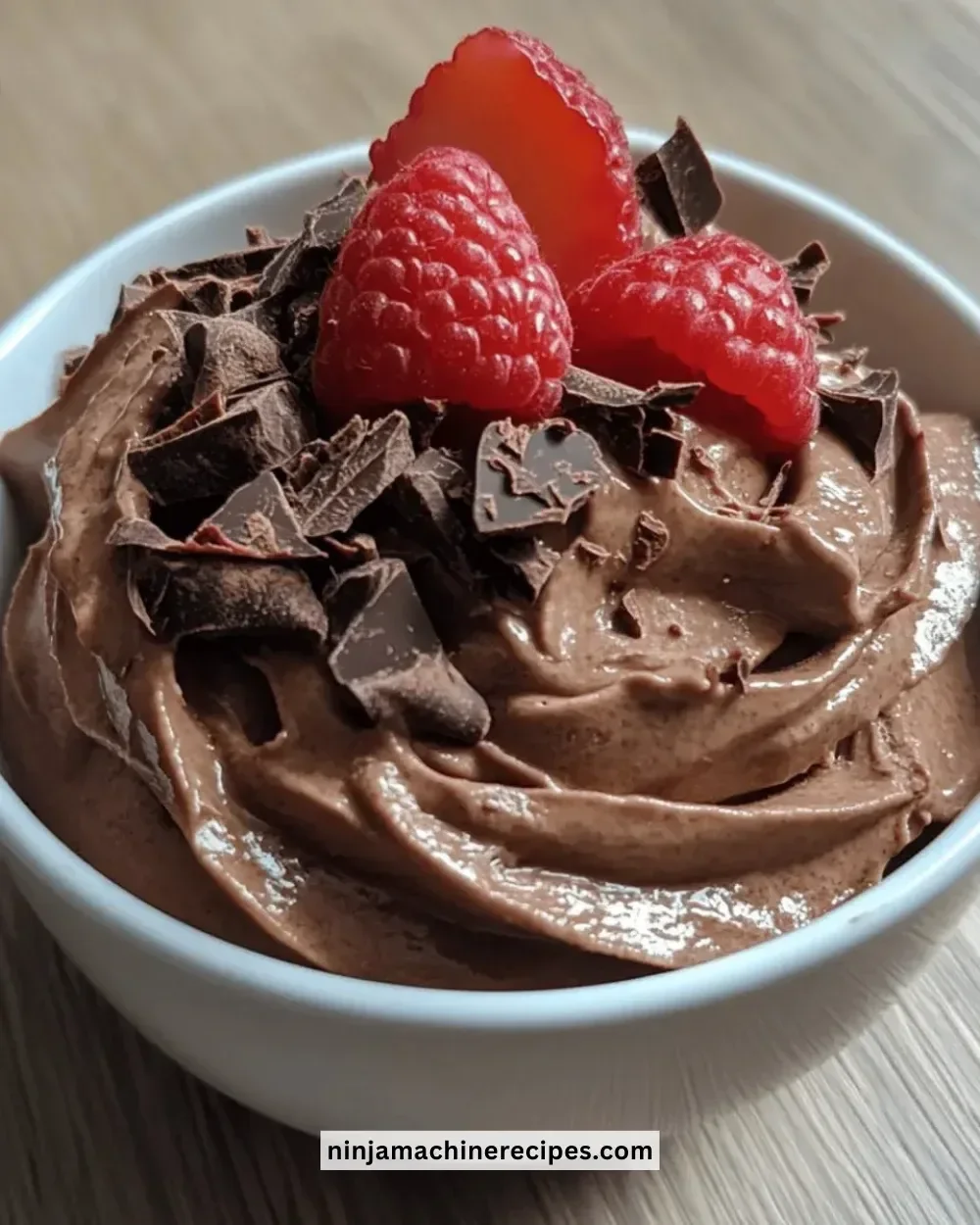 Delicious easy chocolate mousse mix prepared in a bowl with chocolate shavings on top