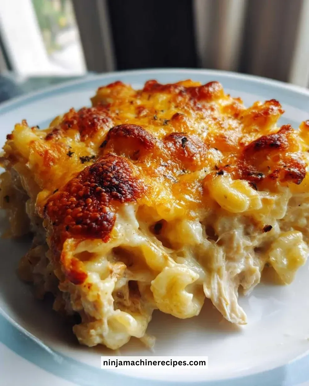 Extra Cheesy Tuna Noodle Casserole baked dish with melted cheese