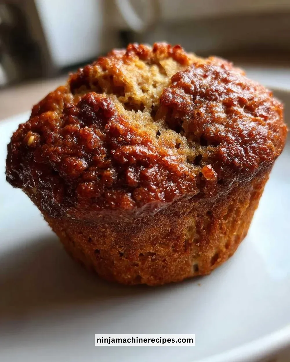 Delicious fluffy vegan banana muffins on a wooden table