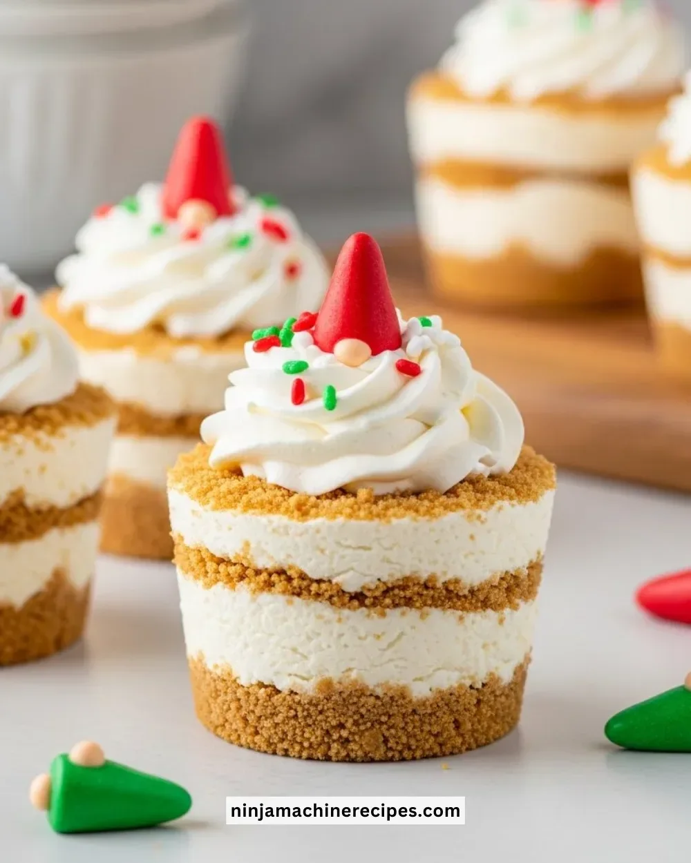 Gnome Cheesecake Fluff Cups topped with colorful sprinkles and festive decorations