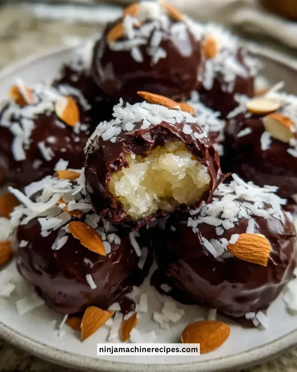 Delicious homemade Almond Joys with chocolate and coconut filling