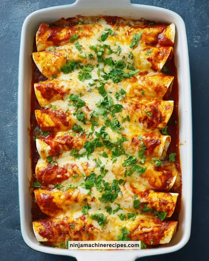Plate of flavorful Over-the-Border Shrimp Enchiladas topped with sauce and garnish.
