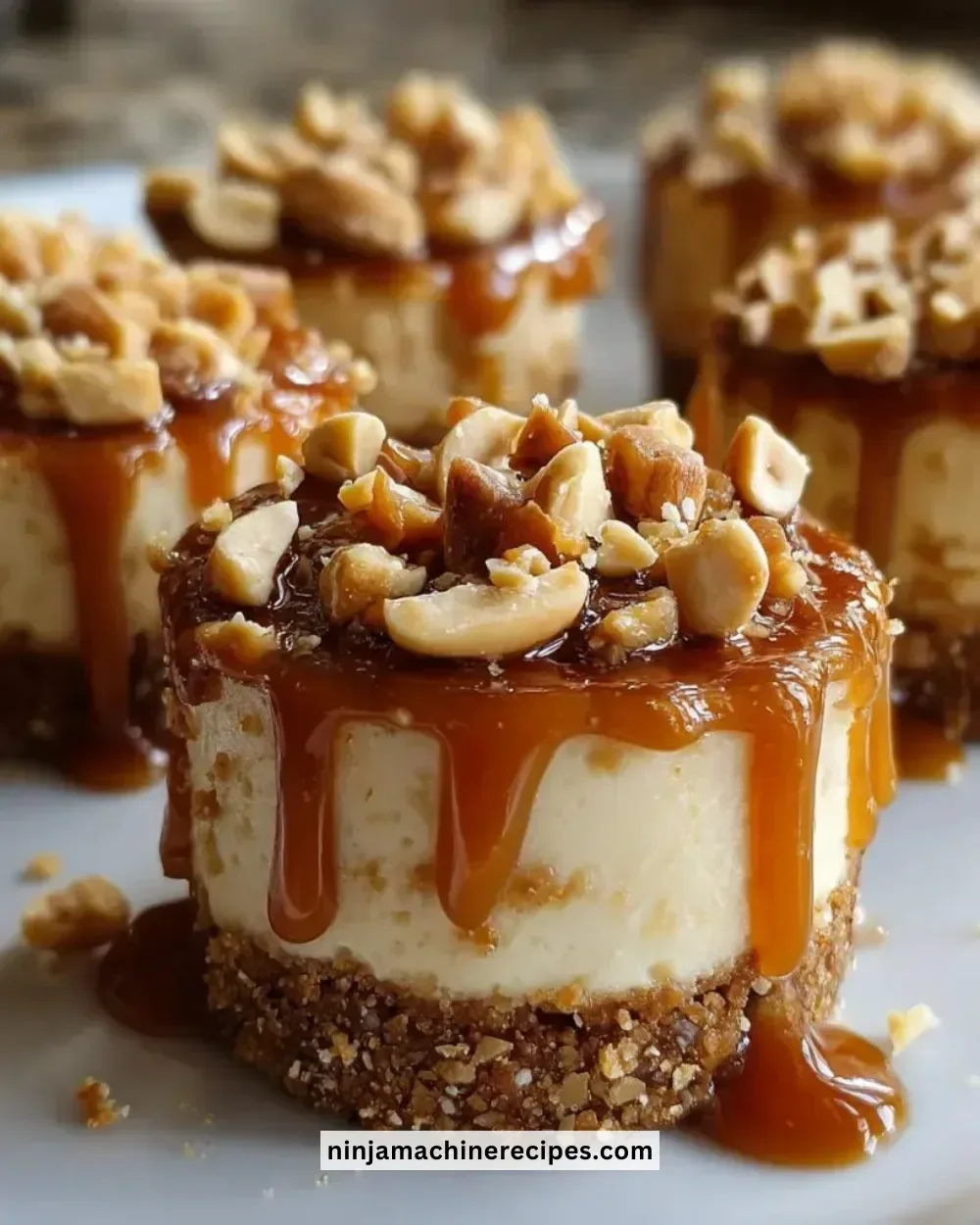 Delicious Peanut Butter Caramel Mini Bars stacked on a plate