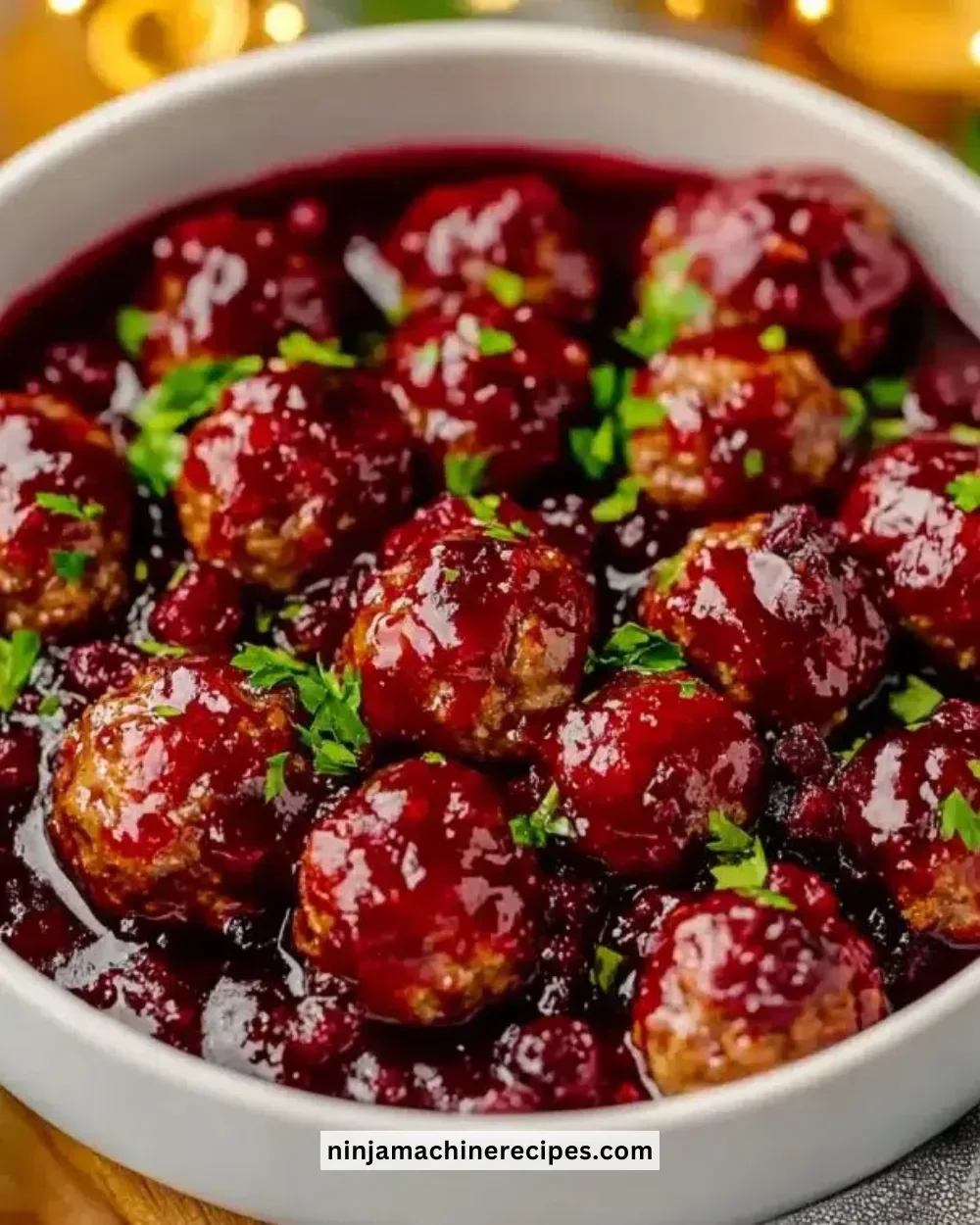 Quick Christmas cranberry meatballs served on a festive plate.