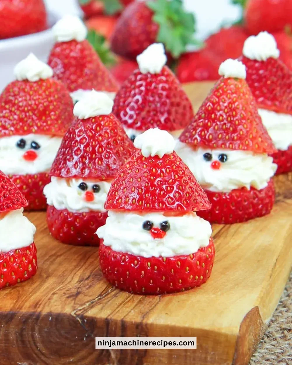Festively decorated Strawberry Santas for holiday celebrations.