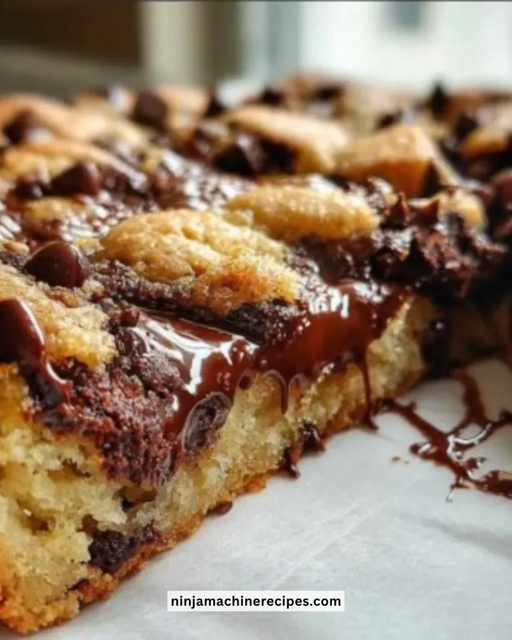 Ultimate gooey chocolate chip skillet cookie served hot in a cast iron skillet