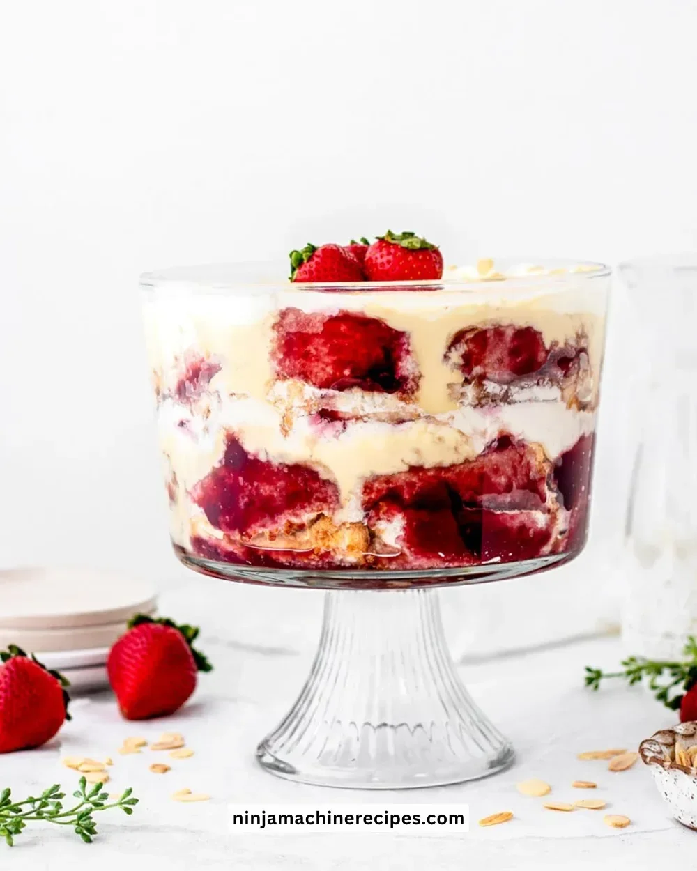 Deliciously layered English trifle with fruits, custard, and cream dessert