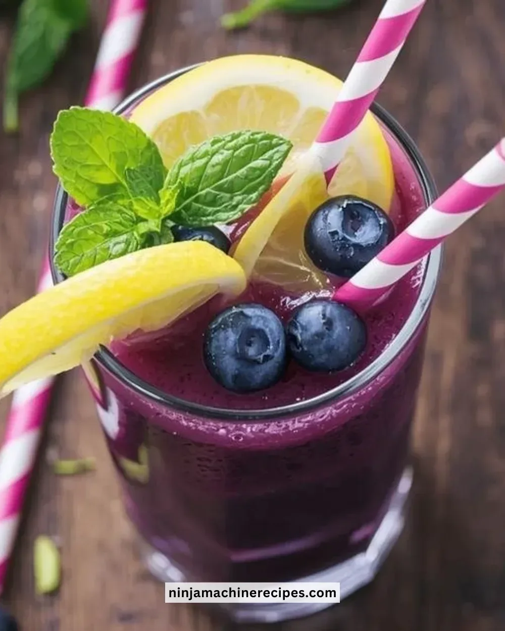 Refreshing blueberry-lemon slushie in a glass with ice