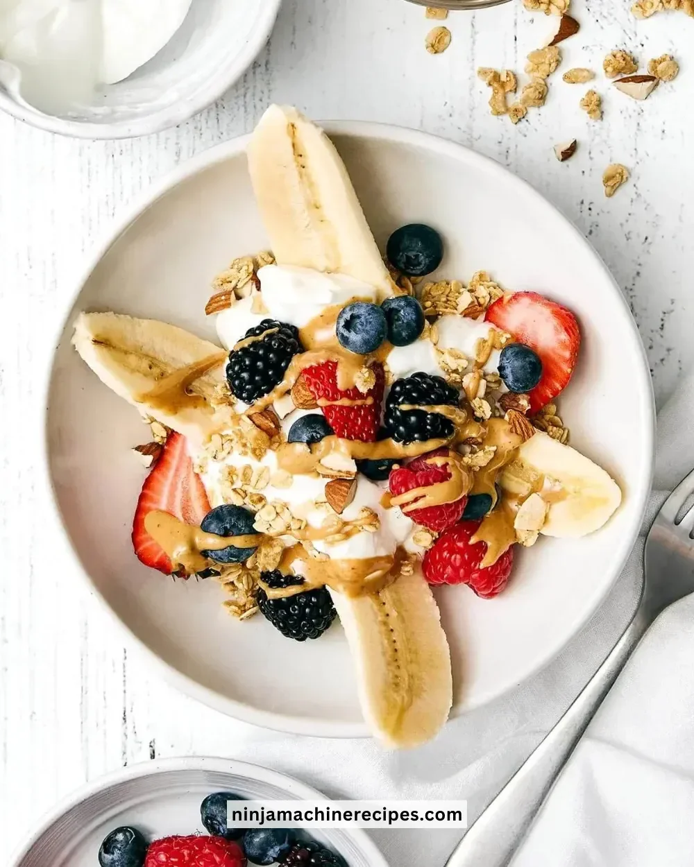 Delicious Breakfast Banana Split with fresh fruits and yogurt