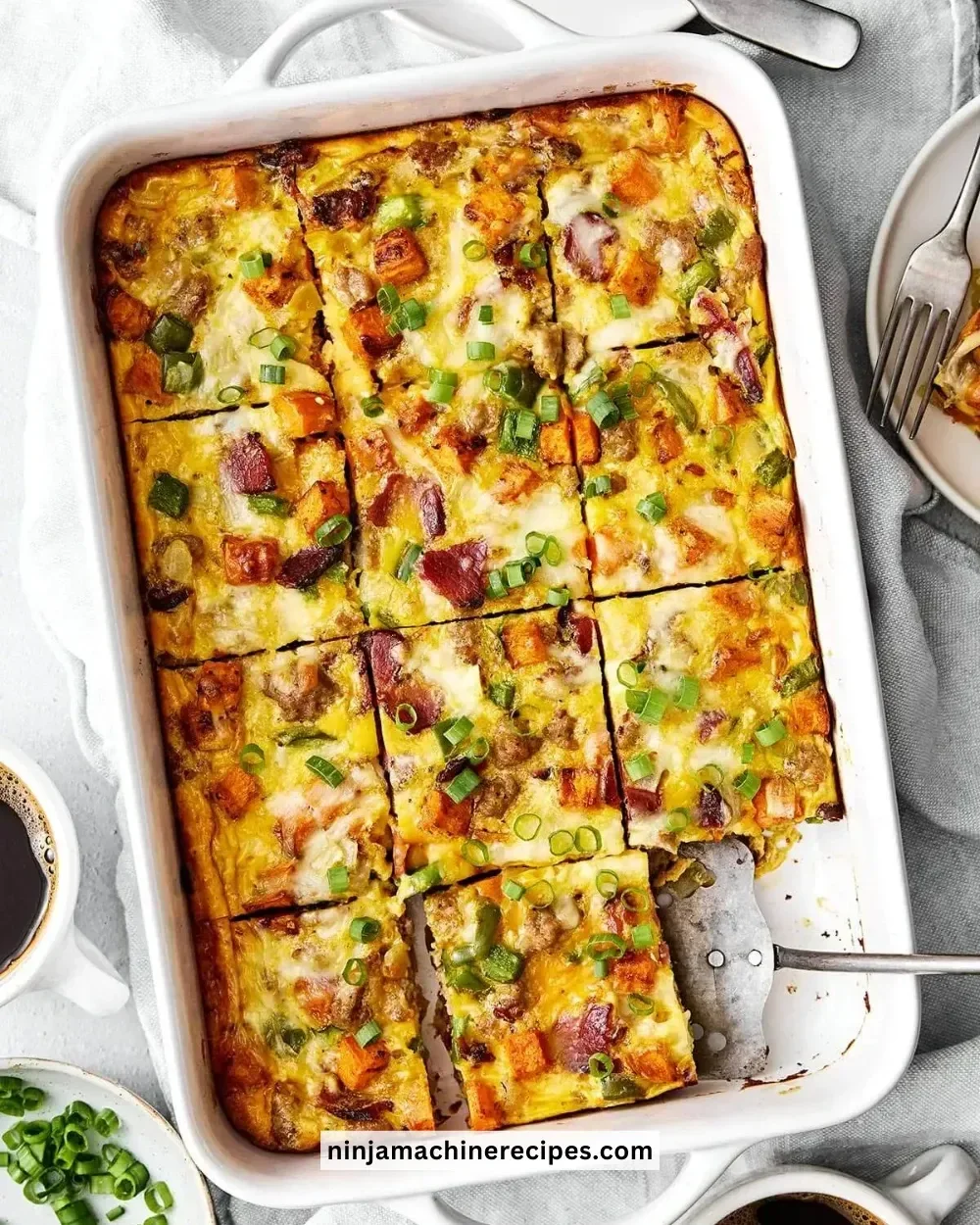 Delicious breakfast casserole ready to serve with eggs and vegetables