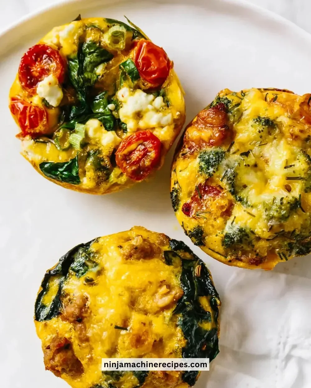 Homemade breakfast egg muffins with vegetables and cheese, healthy meal prep