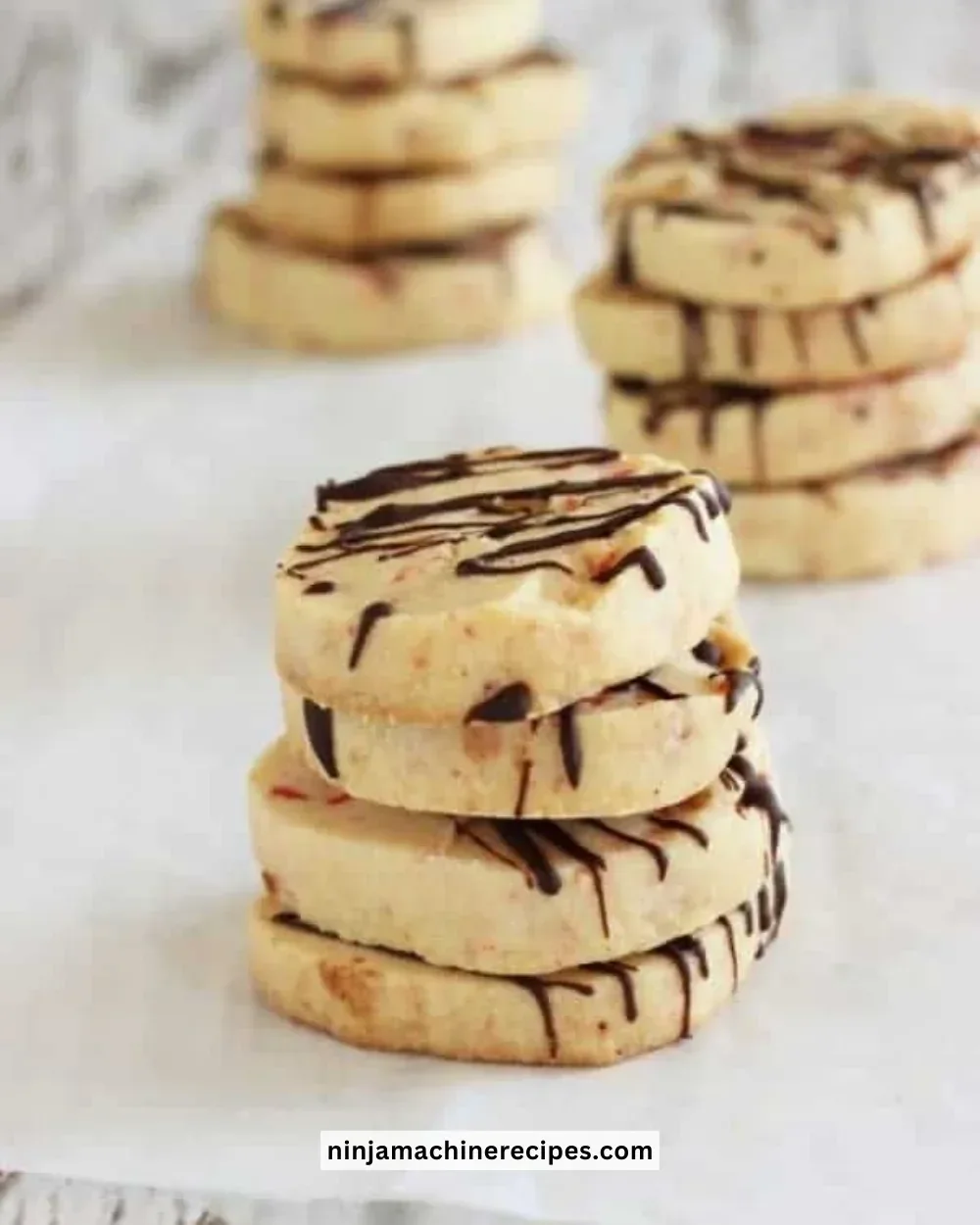 Chocolate peppermint slice-and-bake shortbread cookies on a cooling rack