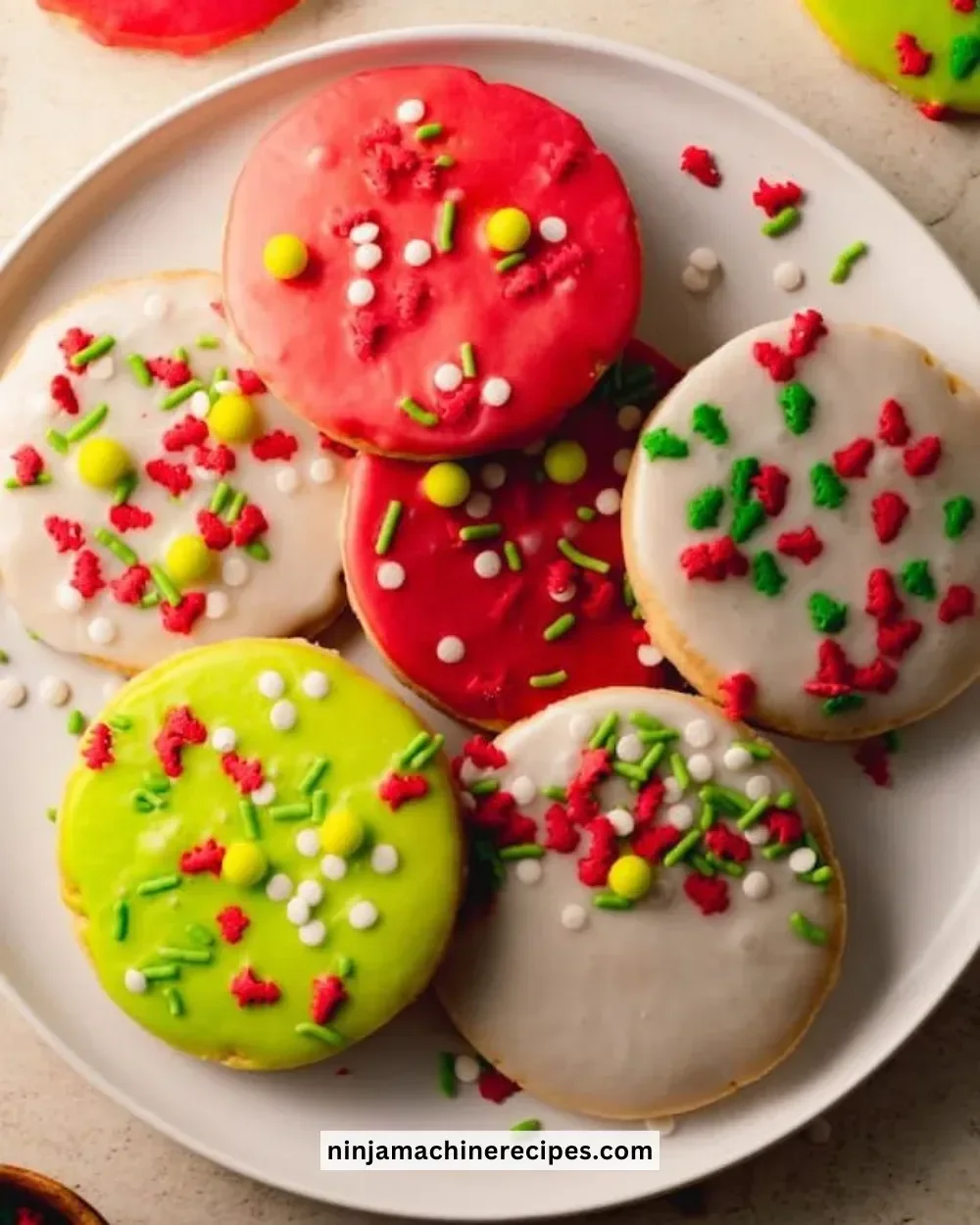 Christmas cut-out shortbread cookies decorated with icing and sprinkles