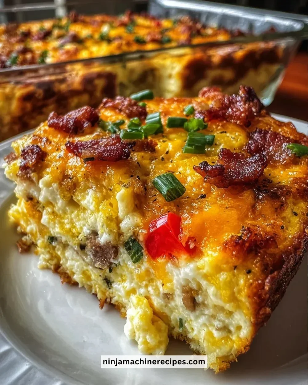 Delicious Crack Breakfast Casserole topped with cheese and herbs