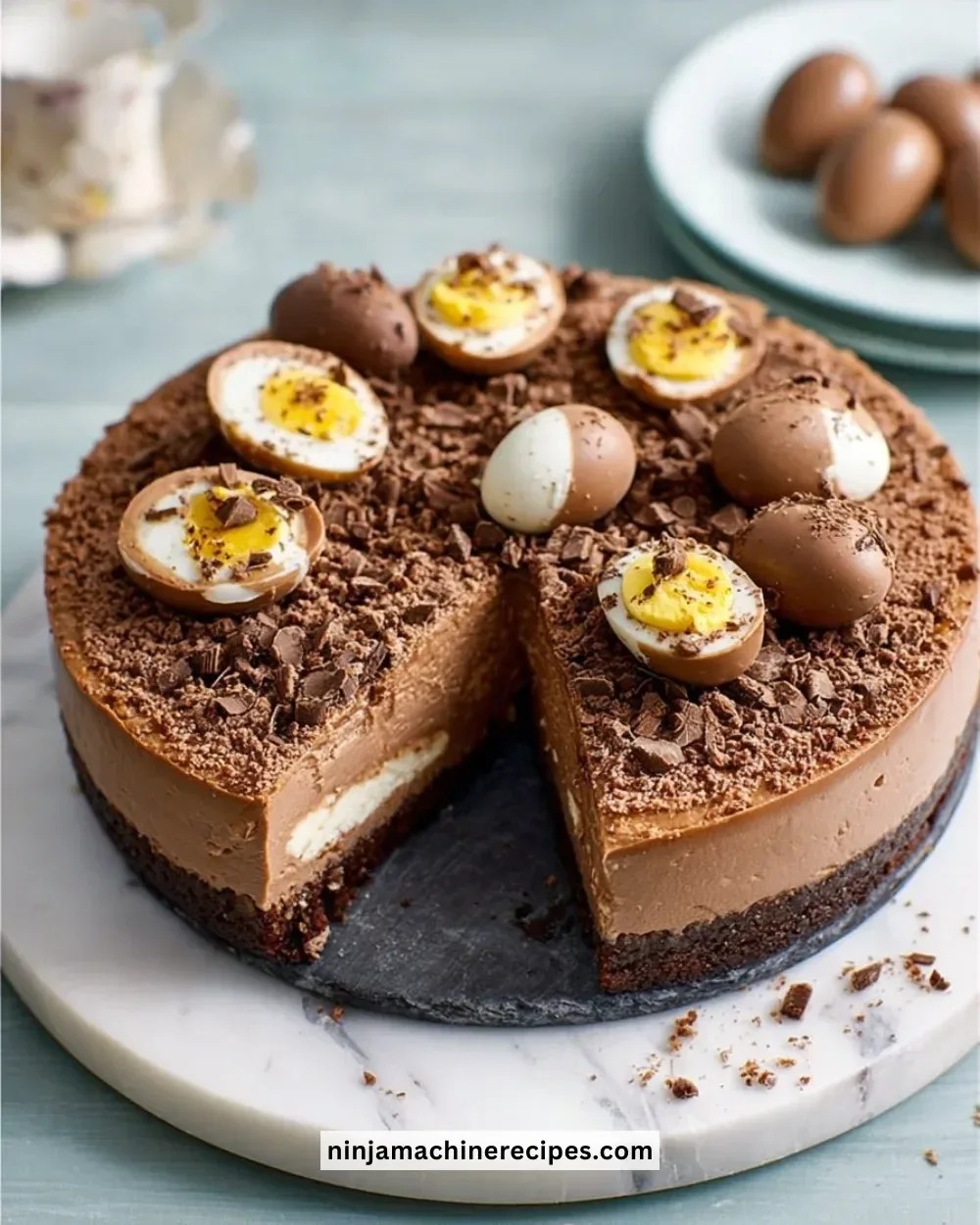 Delicious double chocolate Easter egg cheesecake with a creamy topping