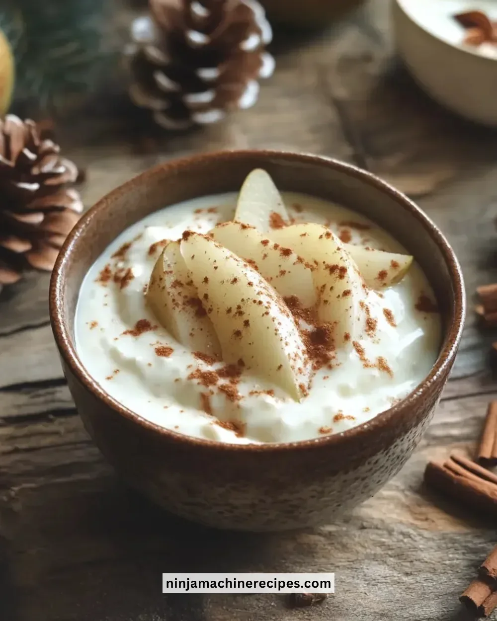 Delicious Christmas spiced pear yogurt topped with festive spices