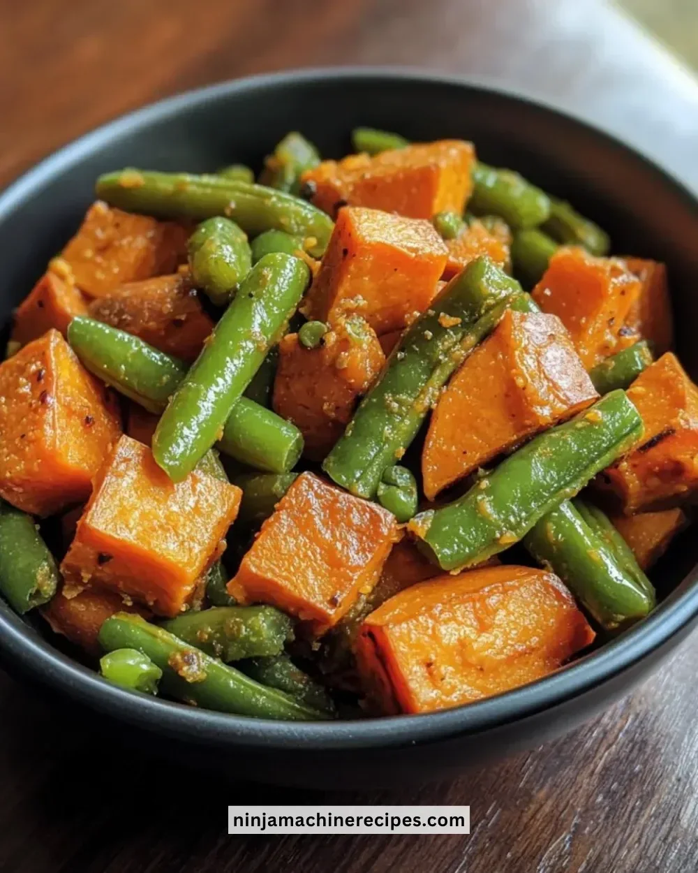 Instant Pot sweet potato and green bean medley served in a dish