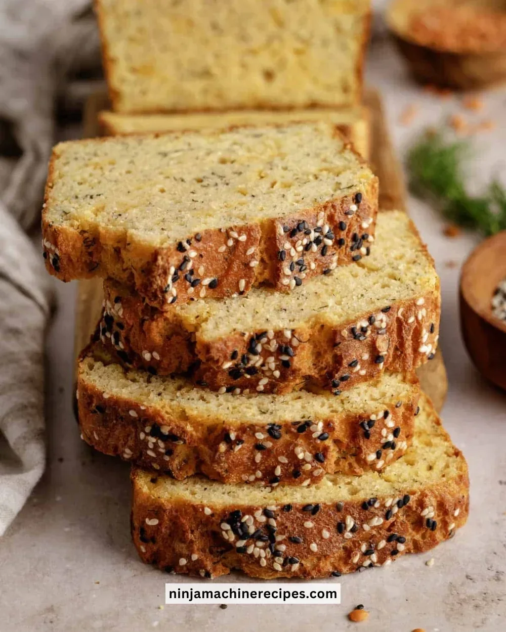 Sliced healthy flourless lentil bread served on a wooden board