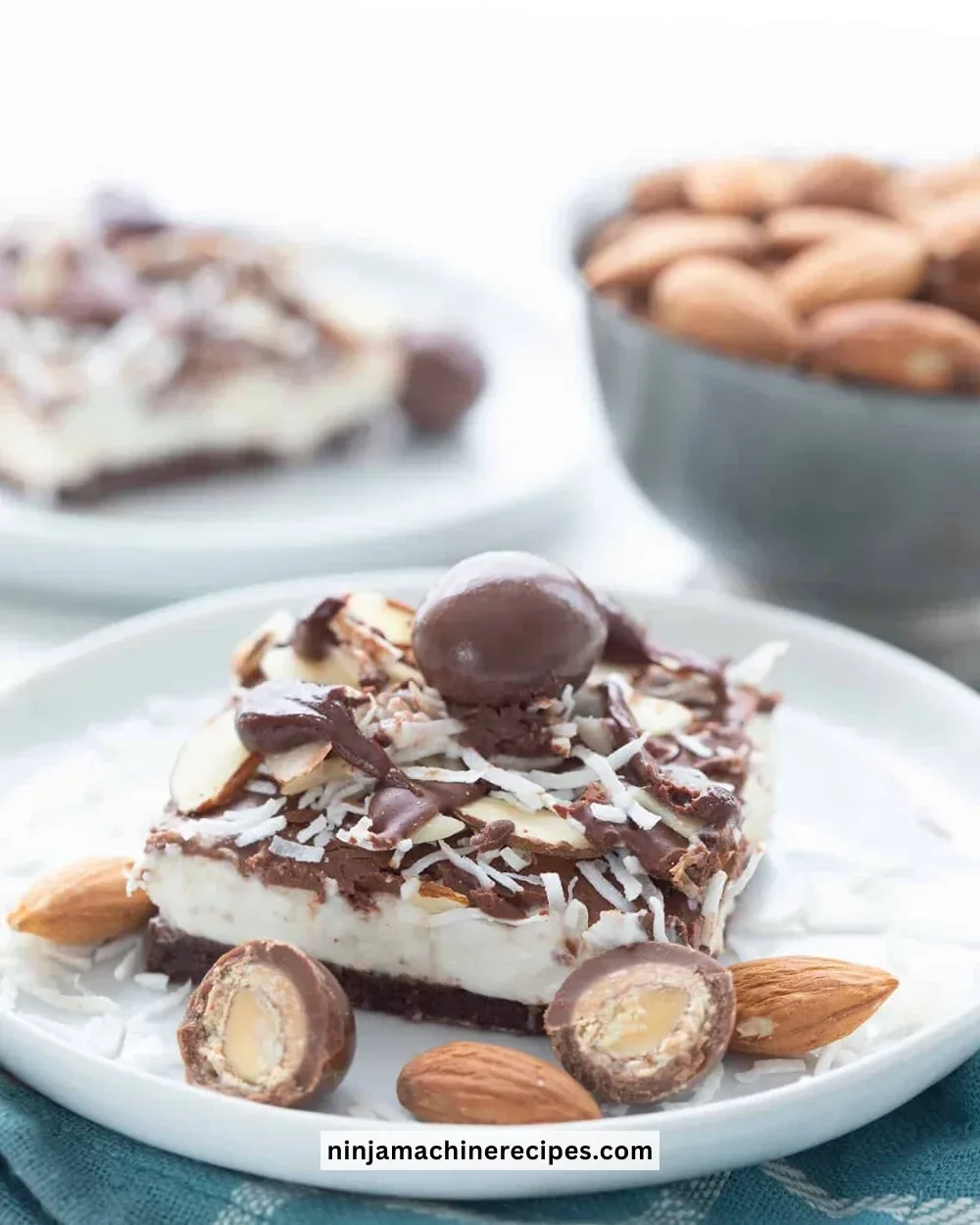 Delicious Keto Almond Joy Cheesecake Bars with chocolate and almonds