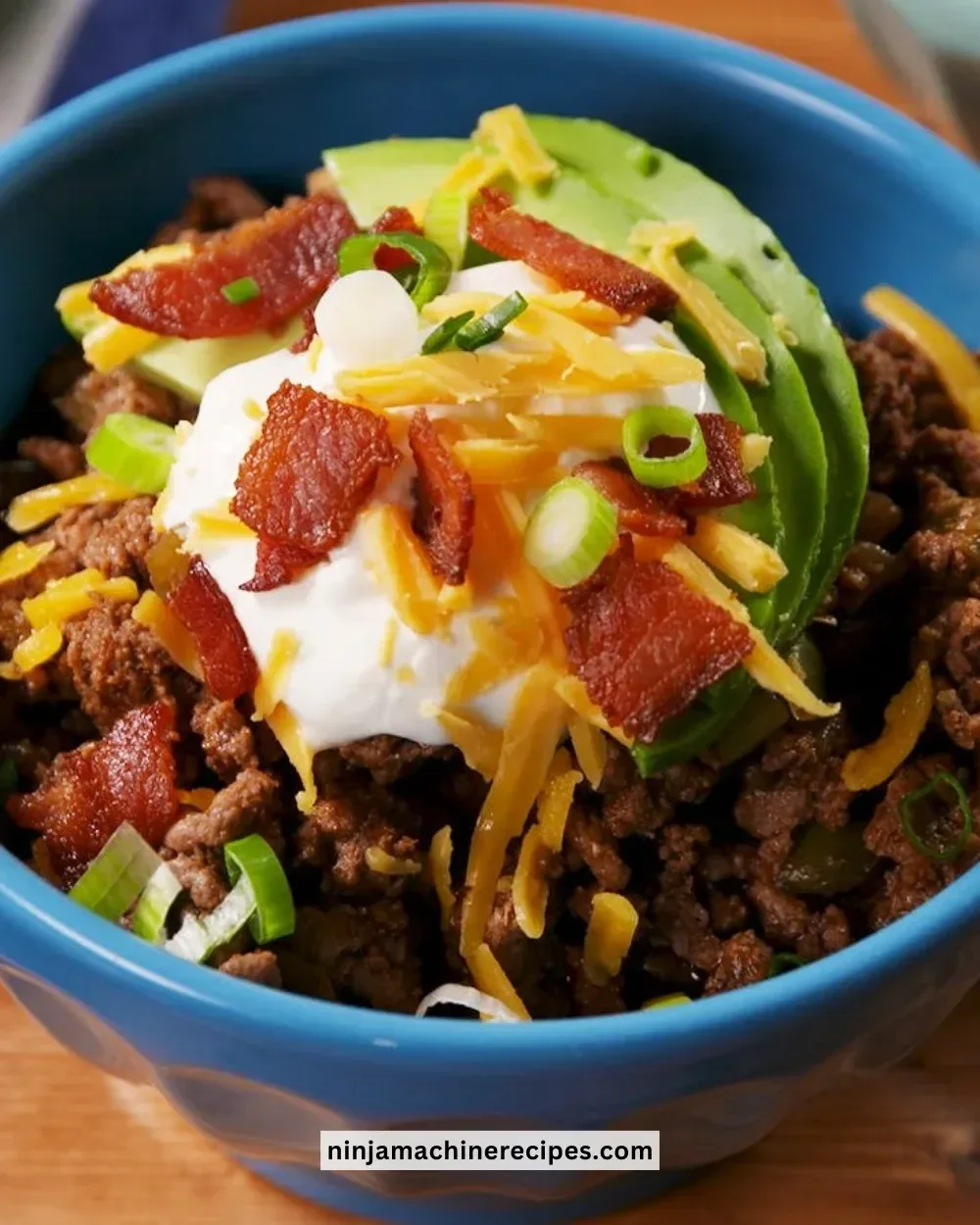 Delicious homemade Keto Chili served in a bowl with toppings.