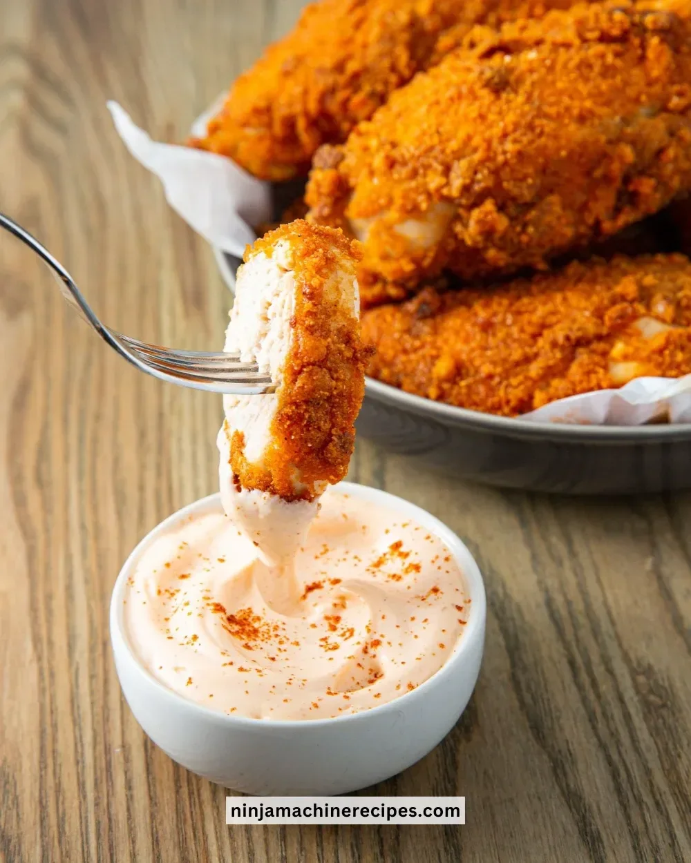 Crispy Keto Fried Chicken served on a plate with herbs and spices