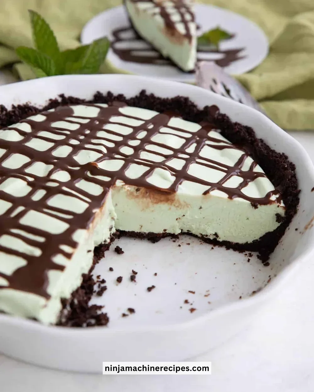 Keto Grasshopper Pie with mint layers and chocolate crust