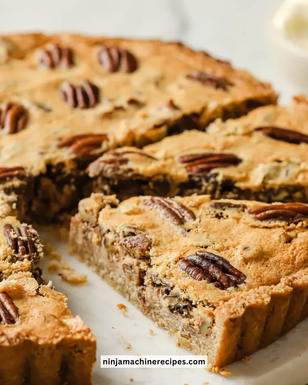 Delicious Keto Pecan Pie served on a plate with whipped cream