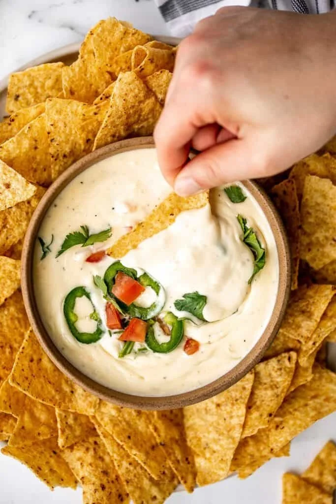 Delicious Mexican cheese dip served with tortilla chips