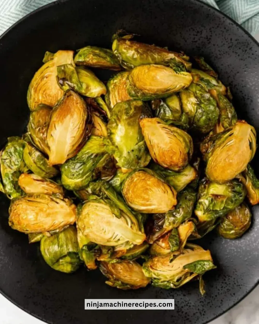 Crispy Ninja Foodi Brussels Sprouts served in a bowl