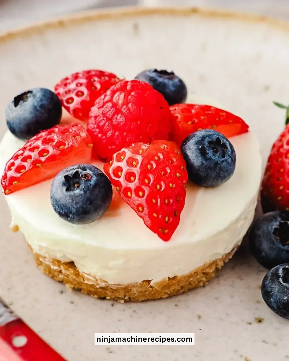 Delicious no bake mini cheesecakes topped with fresh berries and whipped cream