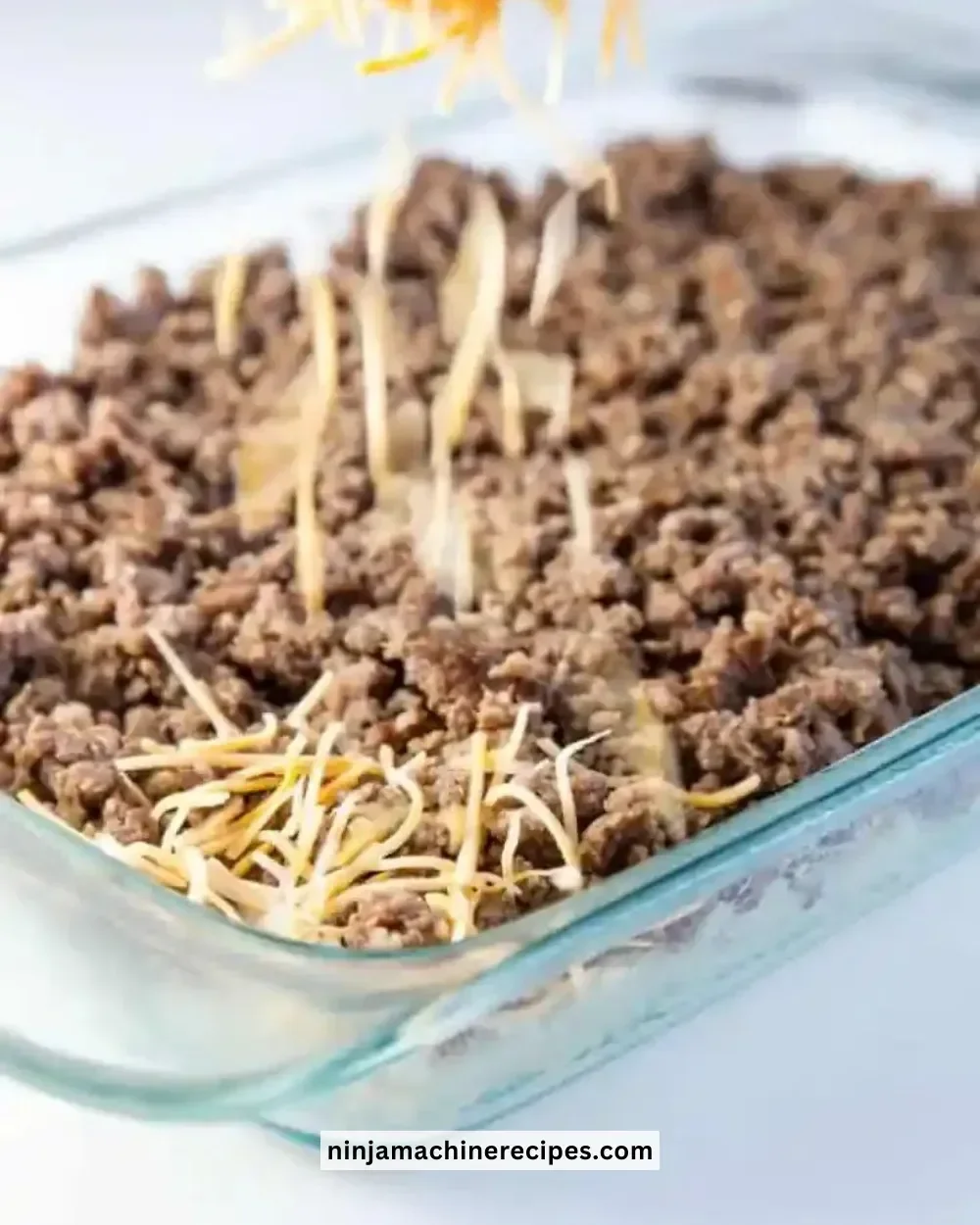 Overnight Cheesy Sausage and Hashbrown Breakfast Casserole ready to serve