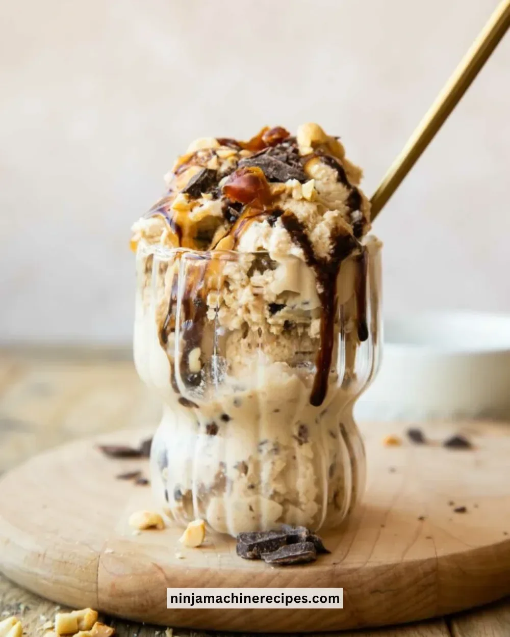 Bowl of creamy protein ice cream topped with fresh berries and nuts