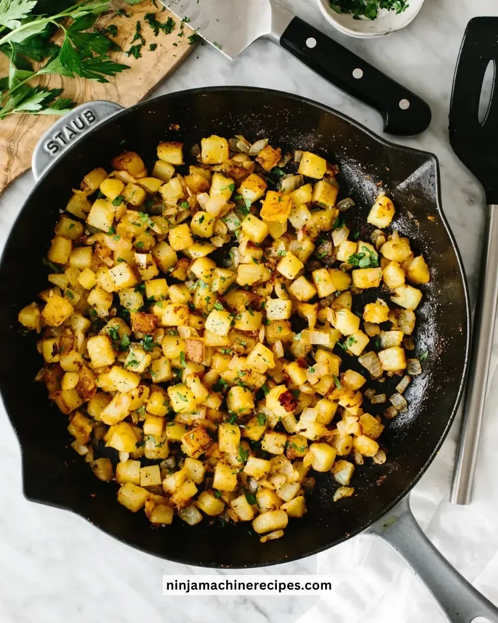 Crispy skillet breakfast potatoes cooked to perfection with herbs.