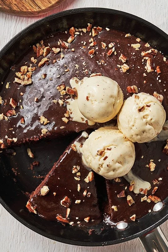 Delicious Skillet Texas Sheet Cake topped with chocolate icing