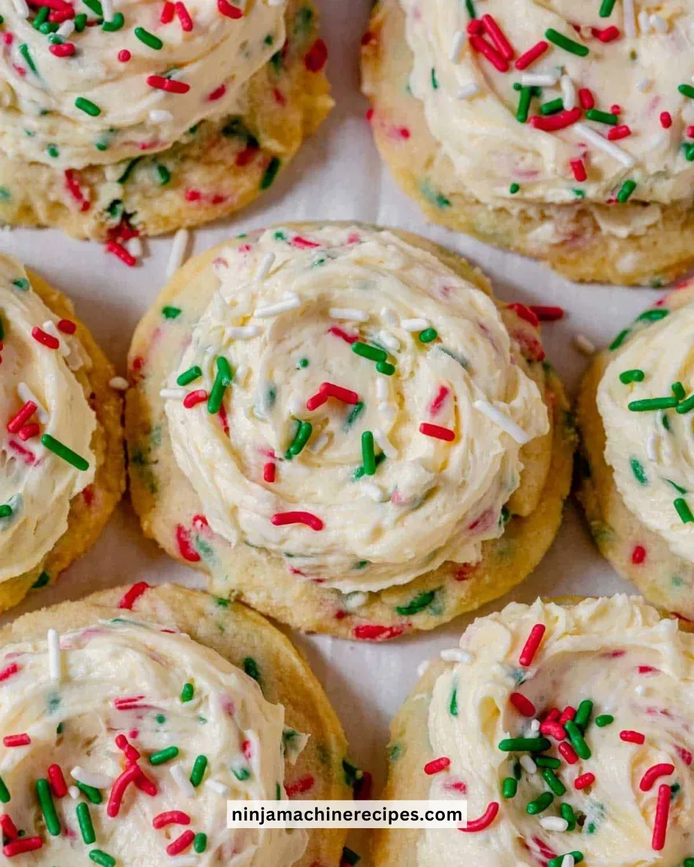 Delicious soft frosted Christmas cookies decorated with colorful icing