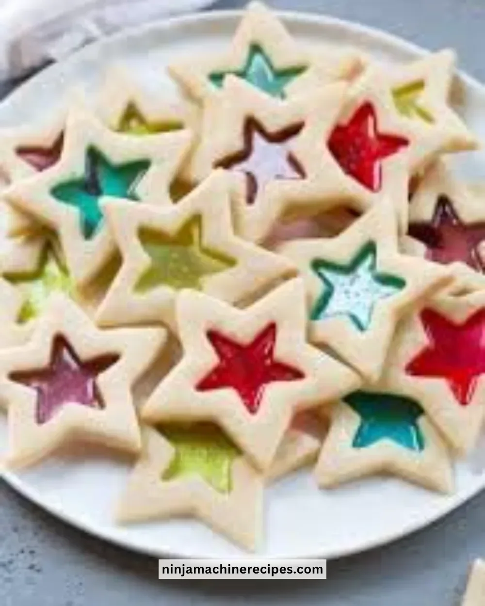 Colorful stained glass cookies showcasing vibrant translucent candy centers