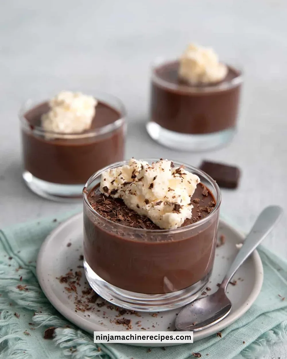 Delicious sugar-free chocolate pudding in a bowl topped with whipped cream