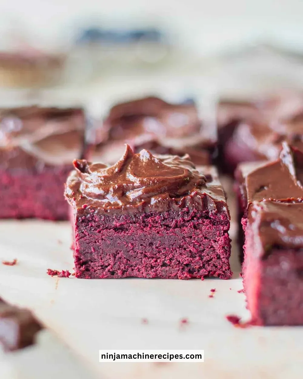 Vegan Beetroot Brownies with creamy Chocolate Avocado Frosting on top.