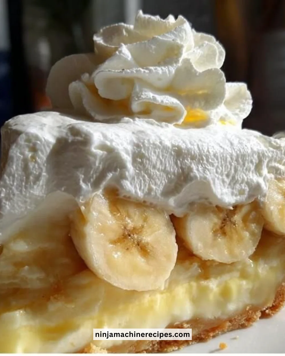 Delicious Banana Cream Pie with layers of creamy filling and whipped cream topping