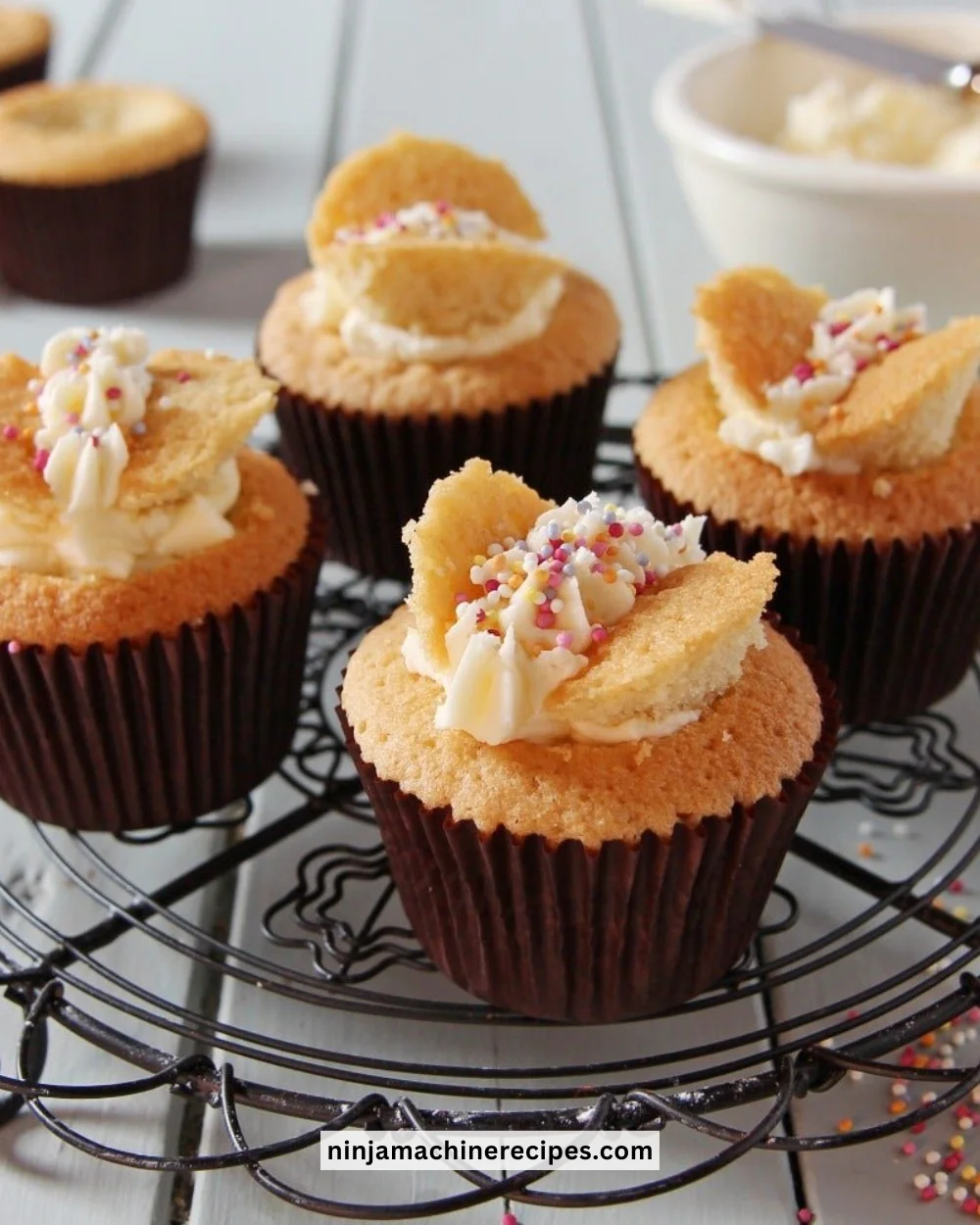 Colorful butterfly cakes decorated with vibrant icing and edible decorations