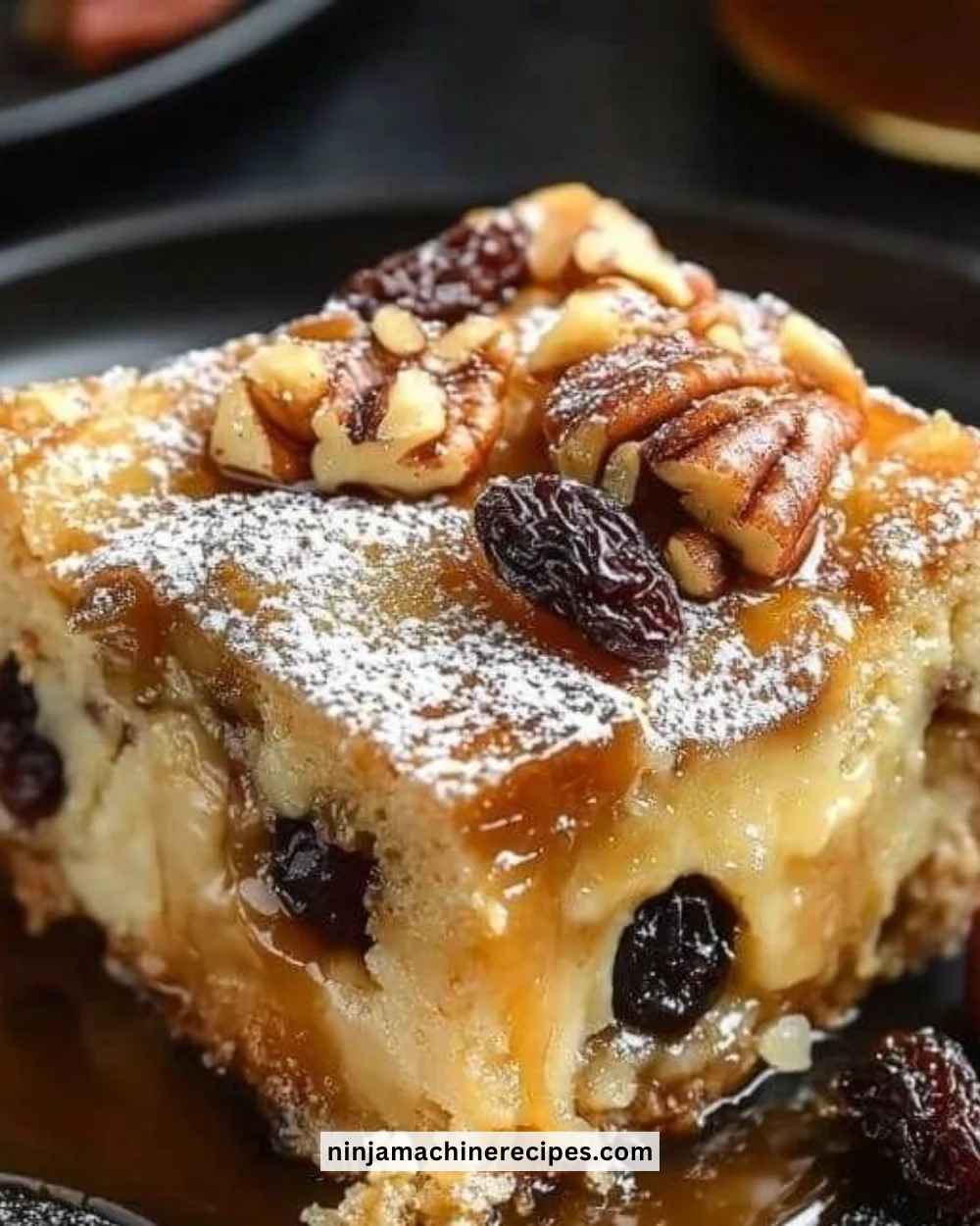 Delicious classic bread pudding served in a bowl with caramel sauce.
