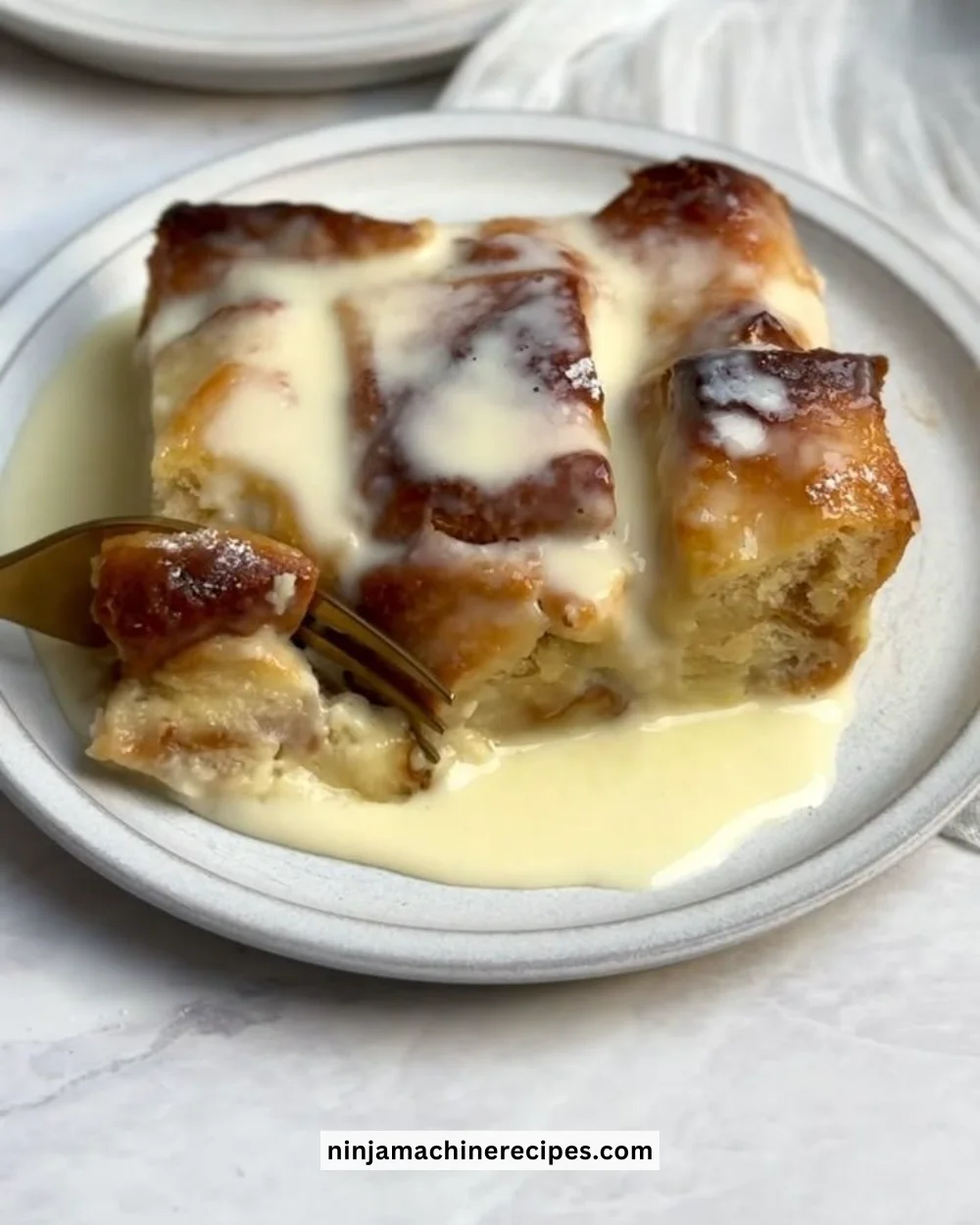 Classic vanilla bread pudding dessert served in a bowl