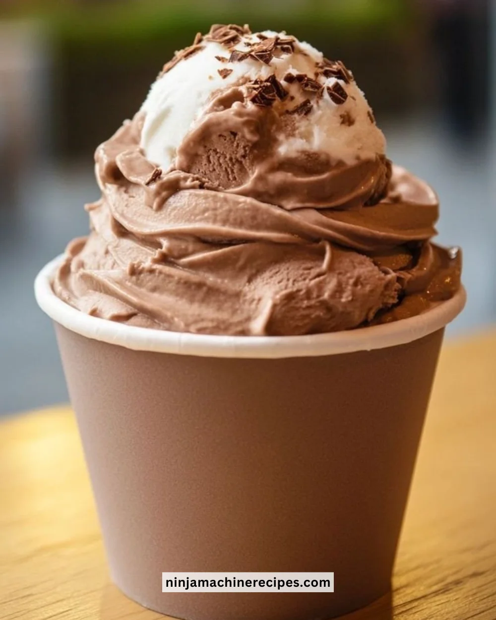 Creamy protein ice cream topped with fresh berries in a bowl