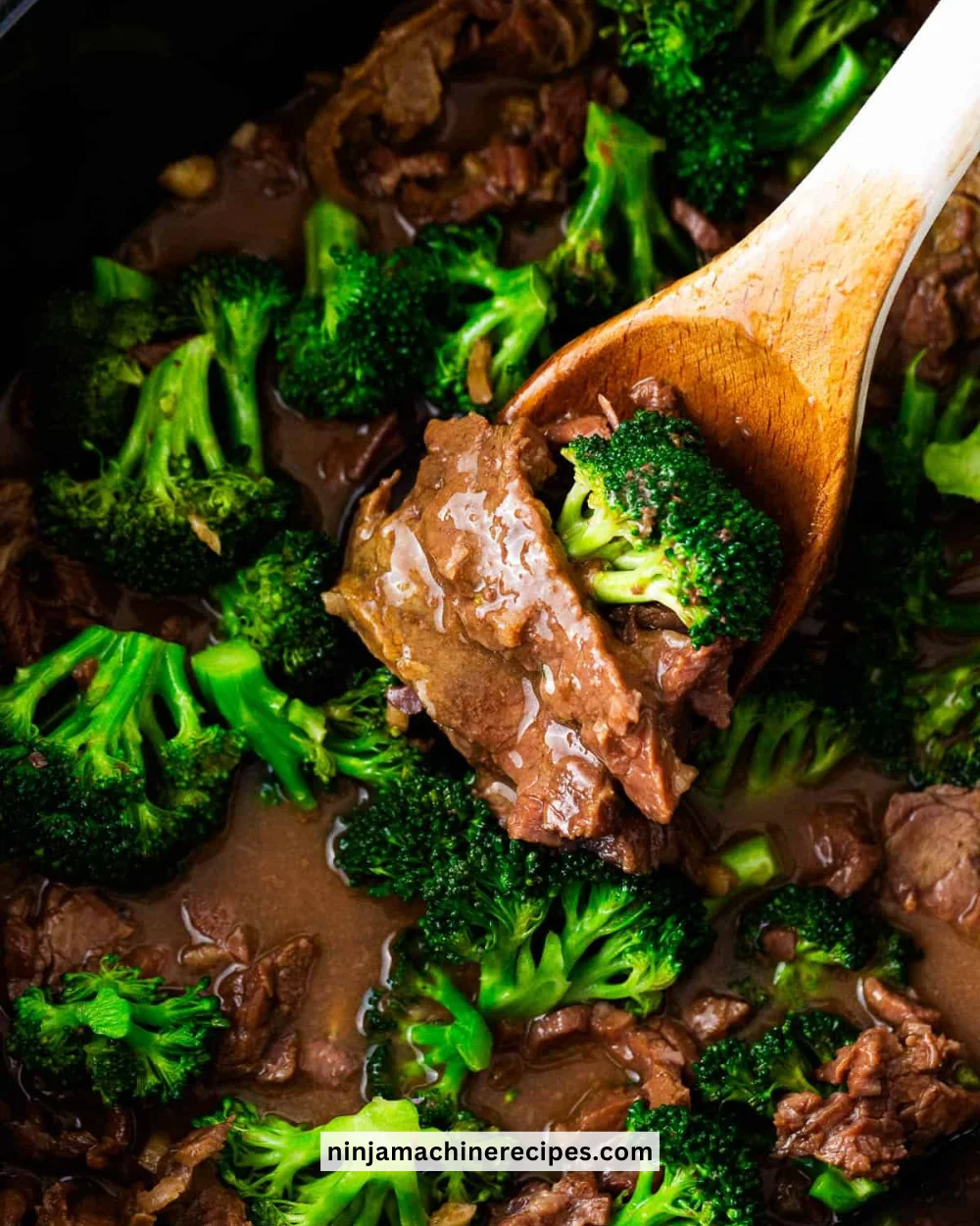 Crockpot Beef and Broccoli served in a bowl with rice